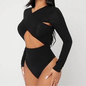 Brand new never worn body suit in black SMALL